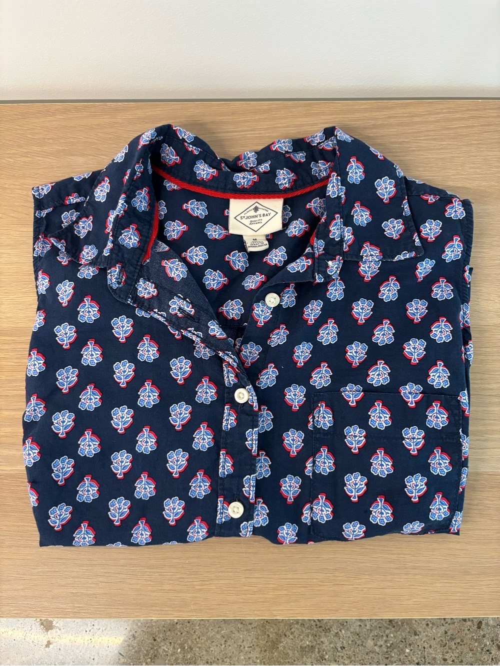 Women’s sleeveless button up shirt with Red & White Floral Print - Size M